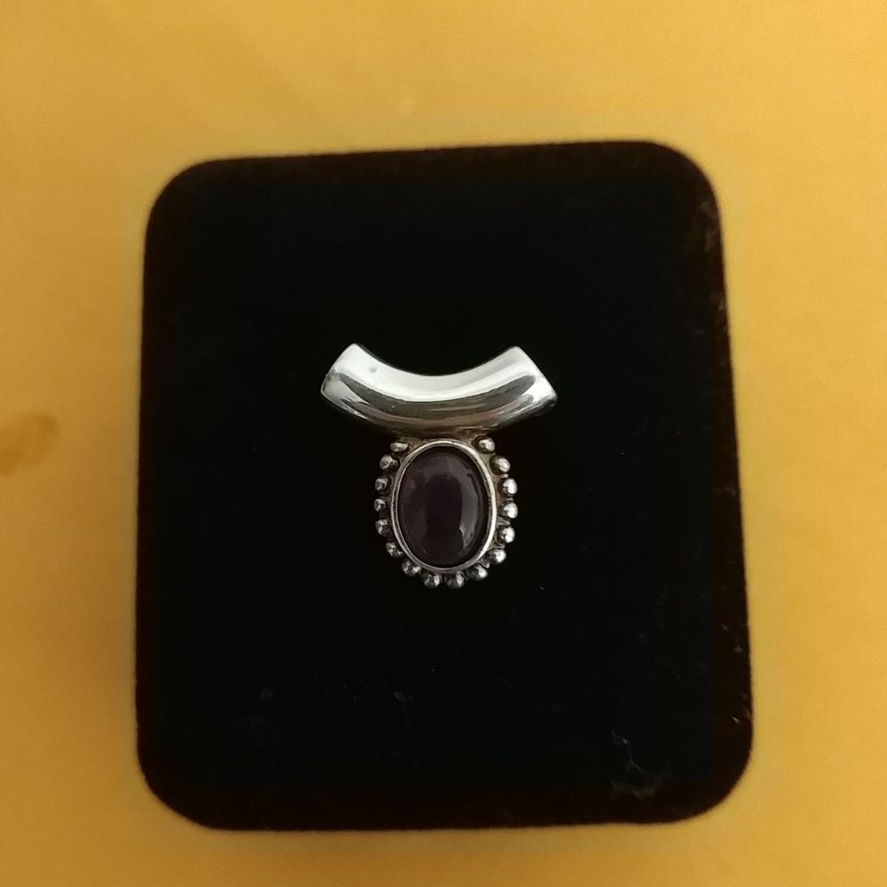 Silver and amethyst pendant